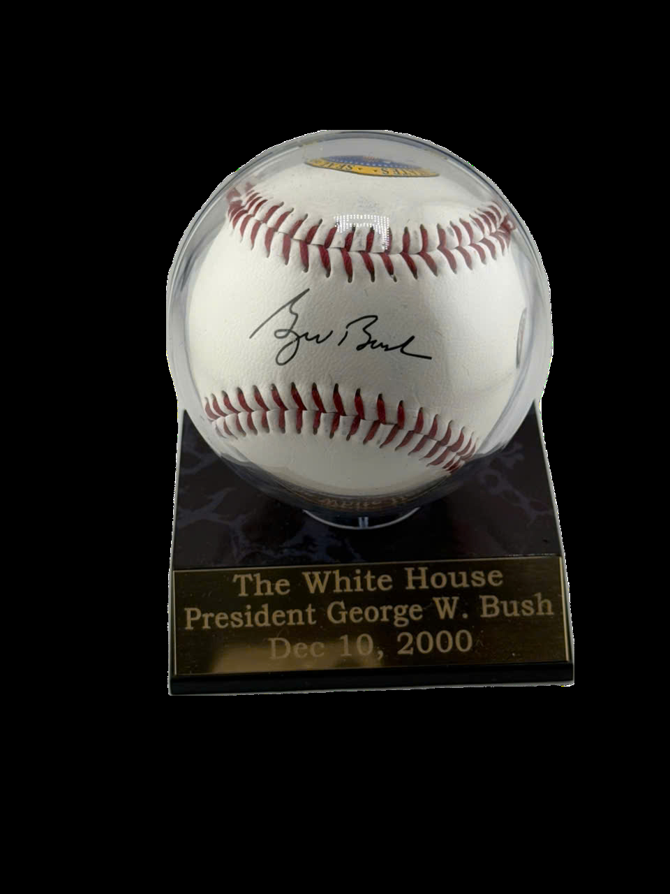 Former President George W. Bush Signed on Baseball Ball with Black Marker and President logo.
